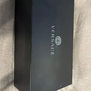 Versace | Shoes | Versace Brown Boots With Ribbed Soles  display picture 1